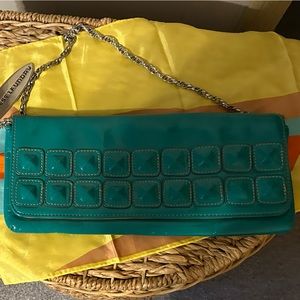 Chinese Laundry teal couch bag with silver chain strap.